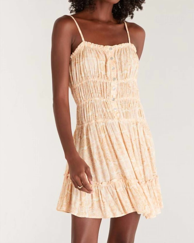 Front of a model wearing a size Large Anabella Medallion Mini Dress In Lemon Zest in Lemon Zest by Z Supply. | dia_product_style_image_id:344720